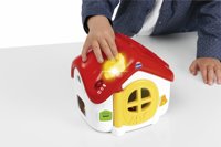 Pequeño botón con forma de pájaro que se ilumina